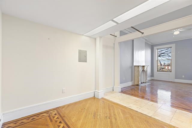 910 Hudson Street, Unit 3 Hoboken, NJ 07030 - Photo 7 of 14 a view of a livingroom with a fireplace