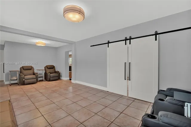 a view of a livingroom with furniture