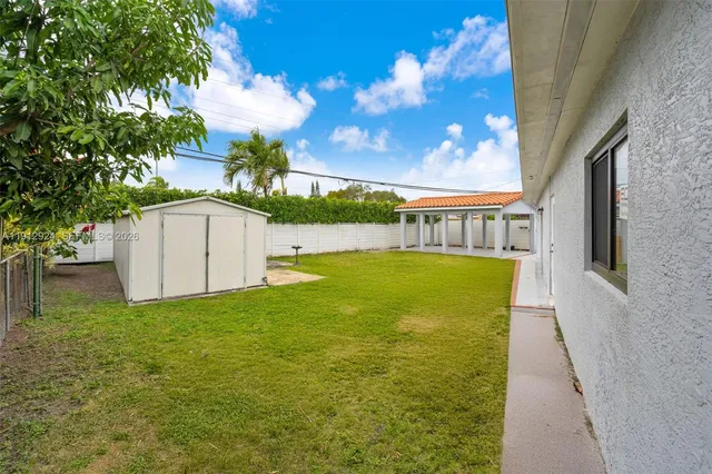 a view of porch with a garden