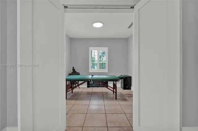 a view of a livingroom and a dinning table in a room