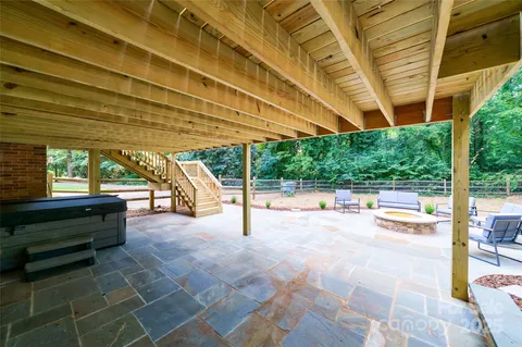 a view of swimming pool with outdoor seating