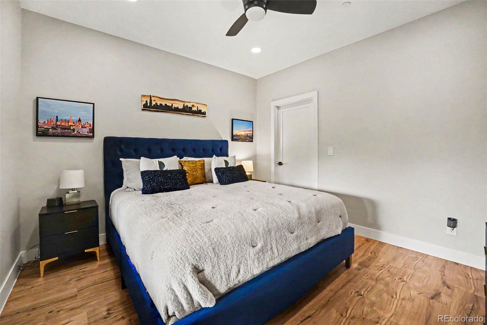 7231 Timber Trail Road Evergreen, CO 80439 - Photo 19 of 35 a bed sitting in a bedroom and a night stand