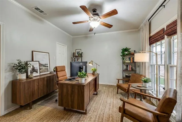 a workspace with furniture and window