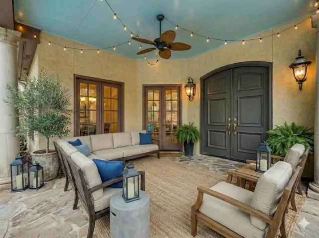 a dining room with furniture and window