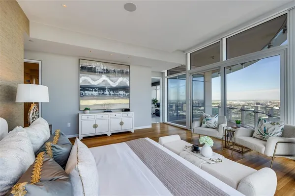 a bathroom with a double vanity sink mirror and shower