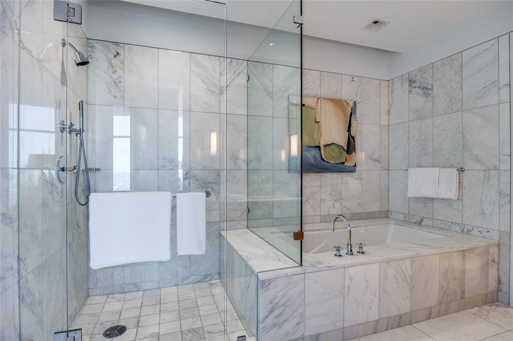 1918 Olive Street, Unit 3601 Dallas, TX 75201 - Photo 25 of 39 a bathroom with a tub a sink and shower
