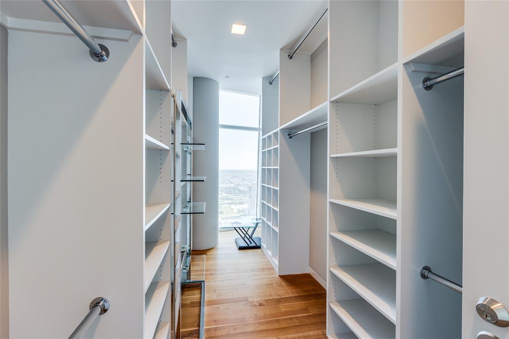 1918 Olive Street, Unit 3601 Dallas, TX 75201 - Photo 26 of 39 a view of walk in closet with empty racks