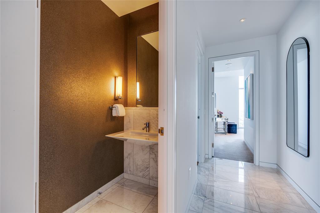 1918 Olive Street, Unit 3601 Dallas, TX 75201 - Photo 30 of 39 a view of a bathroom from the hallway