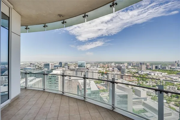 a view of a balcony with city view