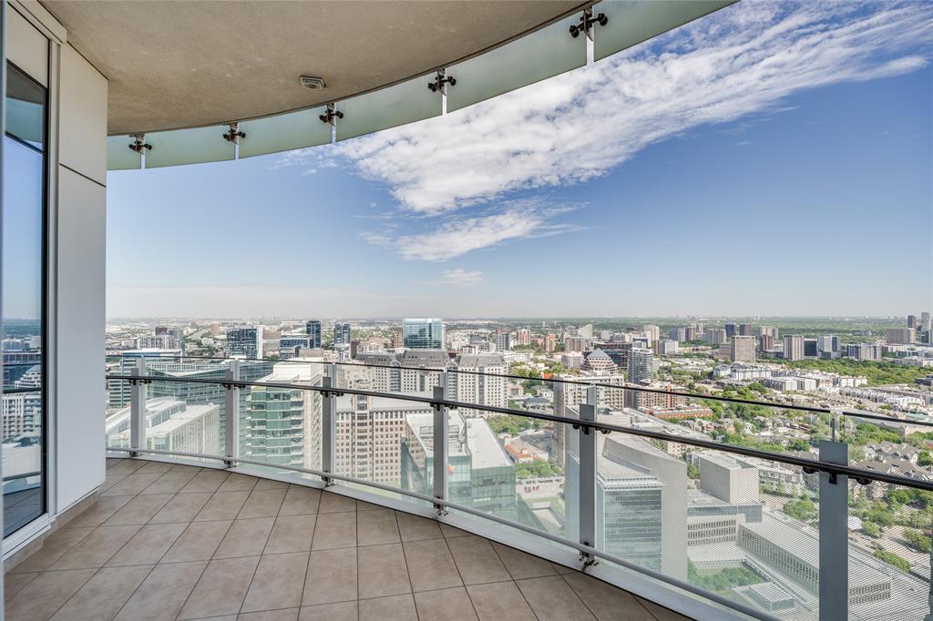 1918 Olive Street, Unit 3601 Dallas, TX 75201 - Photo 32 of 39 a view of a city from a balcony