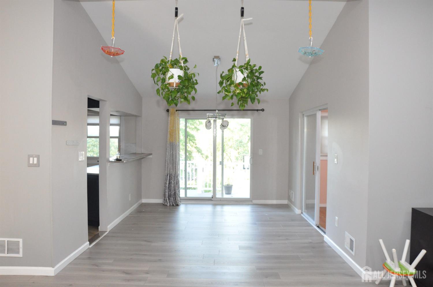 32 Harmon Road Edison, NJ 08837 - Photo 13 of 52 a view of entryway with wooden floor