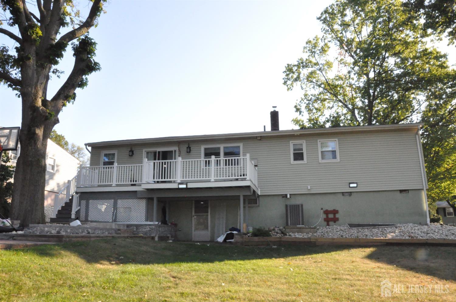 32 Harmon Road Edison, NJ 08837 - Photo 40 of 52 a front view of a house with swimming pool