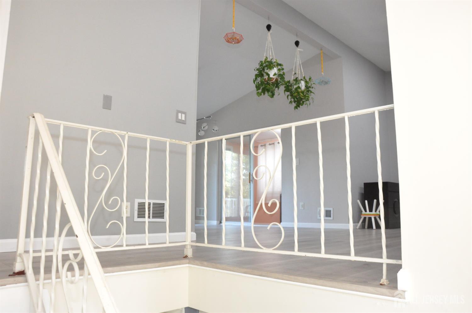 32 Harmon Road Edison, NJ 08837 - Photo 9 of 52 a view of entryway with wooden floor