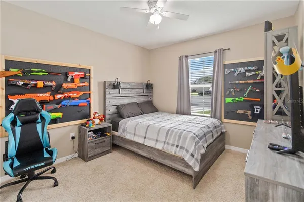 a bed room with a bed and a window