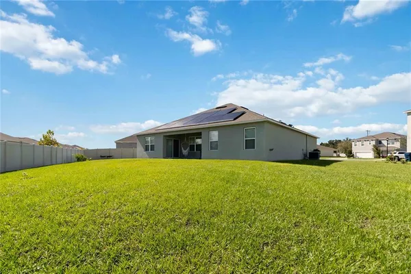 a house view with a outdoor space