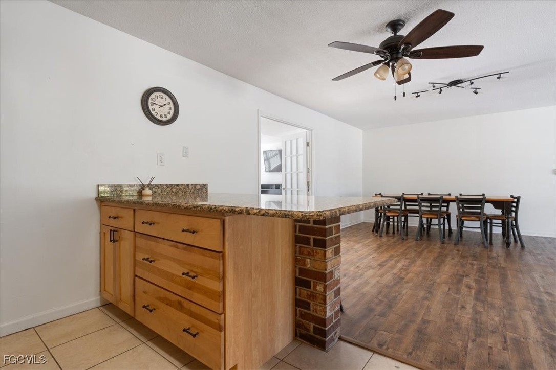 610 East Avenida Del Rio Clewiston, FL 33440 - Photo 15 of 49 a view of a livingroom with furniture and a ceiling fan