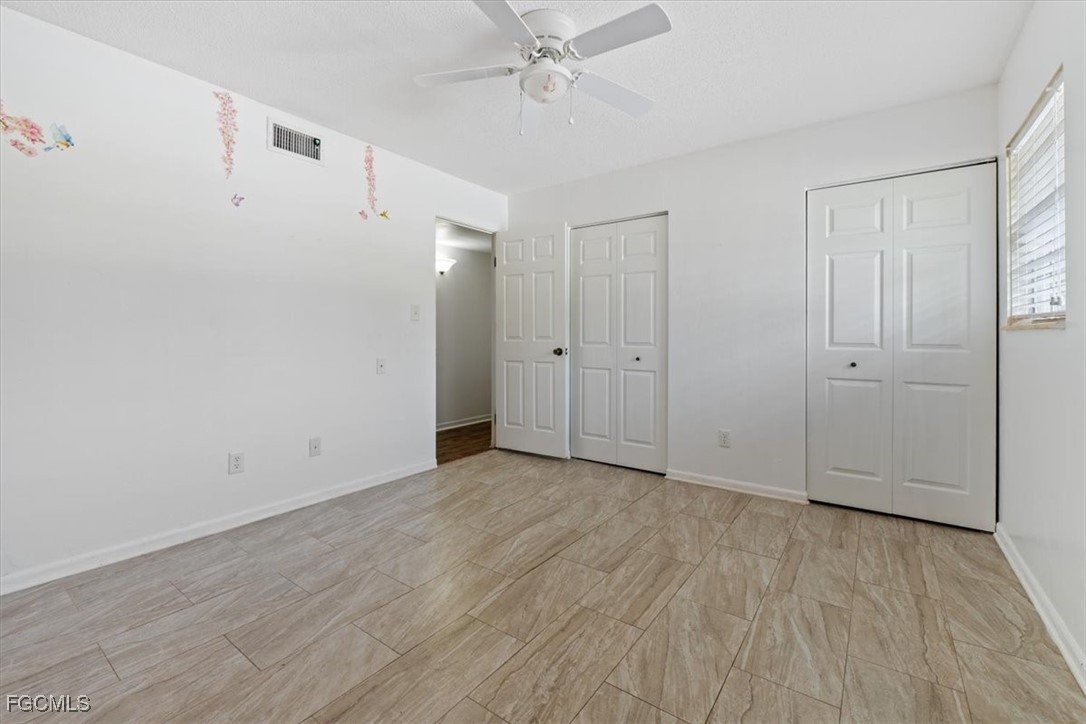 610 East Avenida Del Rio Clewiston, FL 33440 - Photo 28 of 49 a view of an empty room with wooden floor