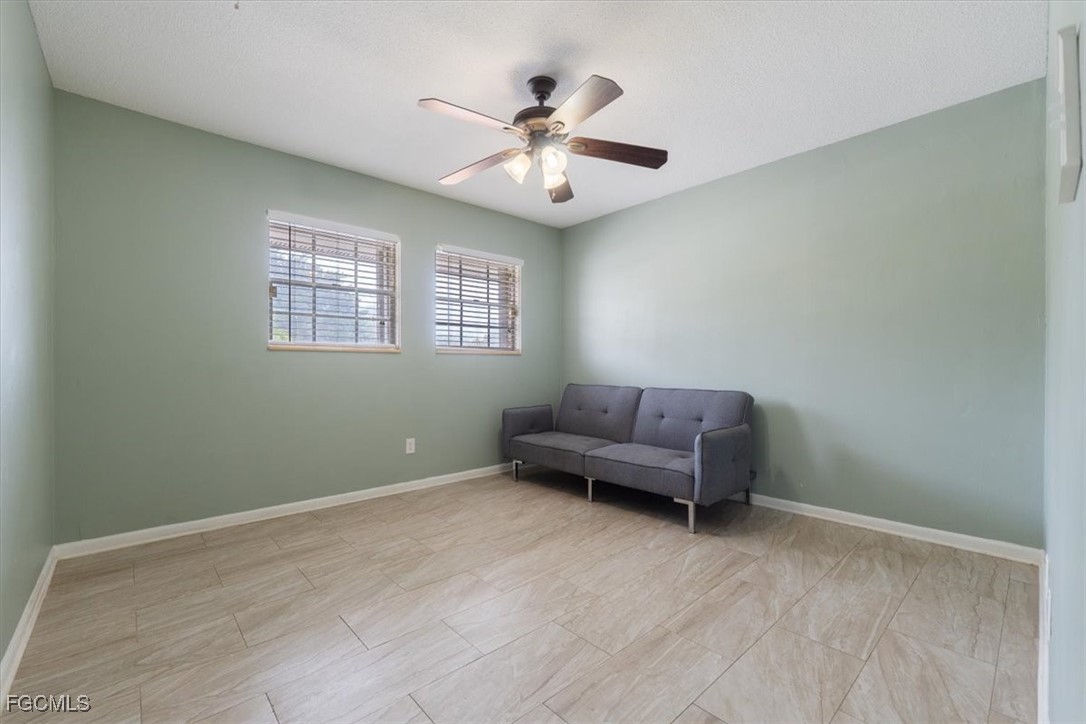 610 East Avenida Del Rio Clewiston, FL 33440 - Photo 34 of 49 a living room with furniture and a window
