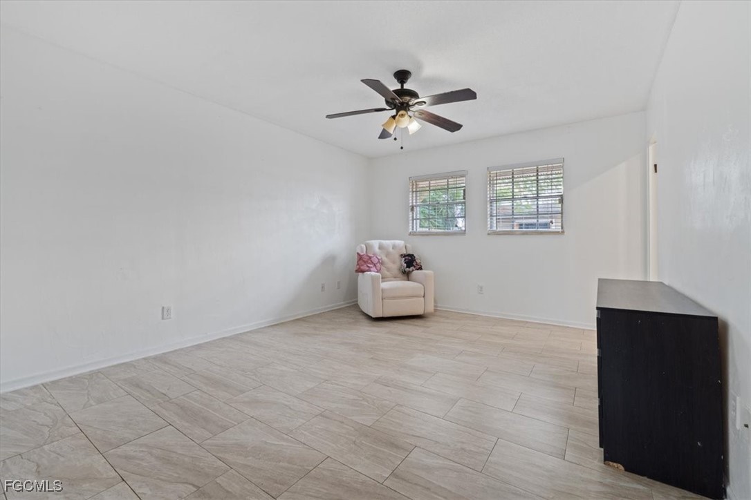 610 East Avenida Del Rio Clewiston, FL 33440 - Photo 36 of 49 a living room with furniture and window