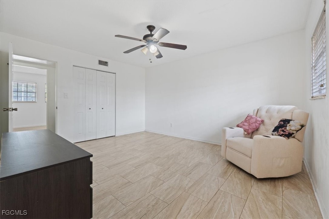 610 East Avenida Del Rio Clewiston, FL 33440 - Photo 37 of 49 a living room with furniture and wooden floor