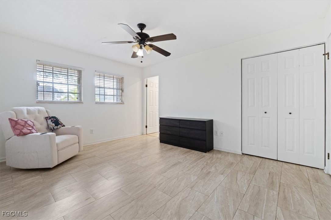 610 East Avenida Del Rio Clewiston, FL 33440 - Photo 38 of 49 a living room with furniture and windows