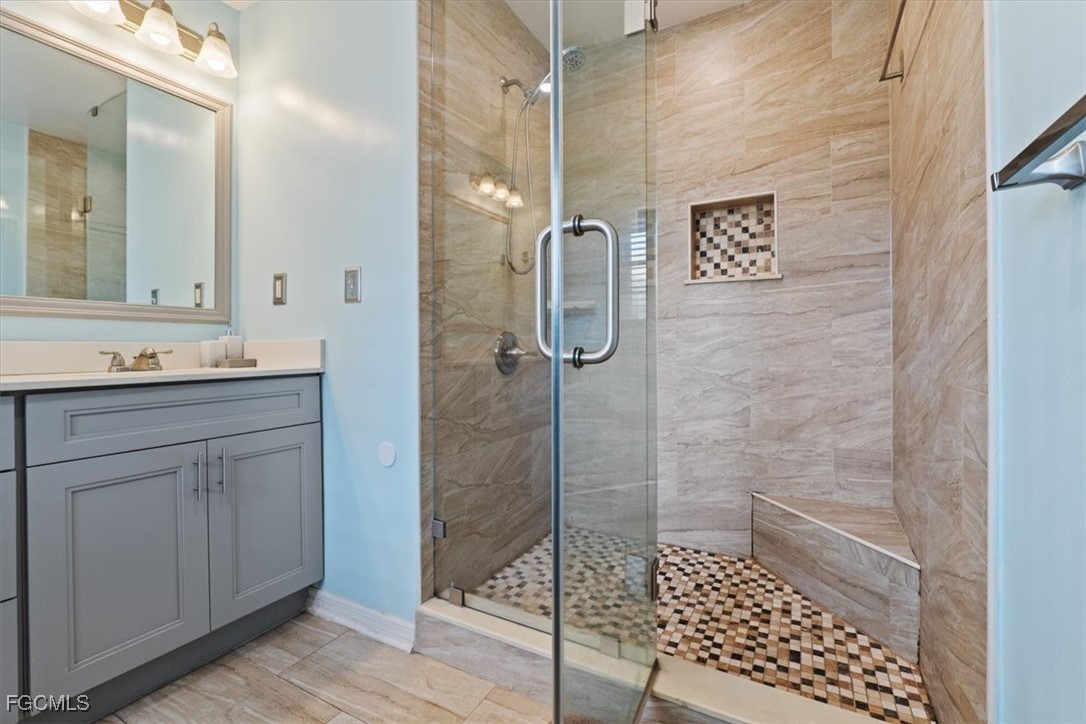 610 East Avenida Del Rio Clewiston, FL 33440 - Photo 41 of 49 a bathroom with a shower and a sink