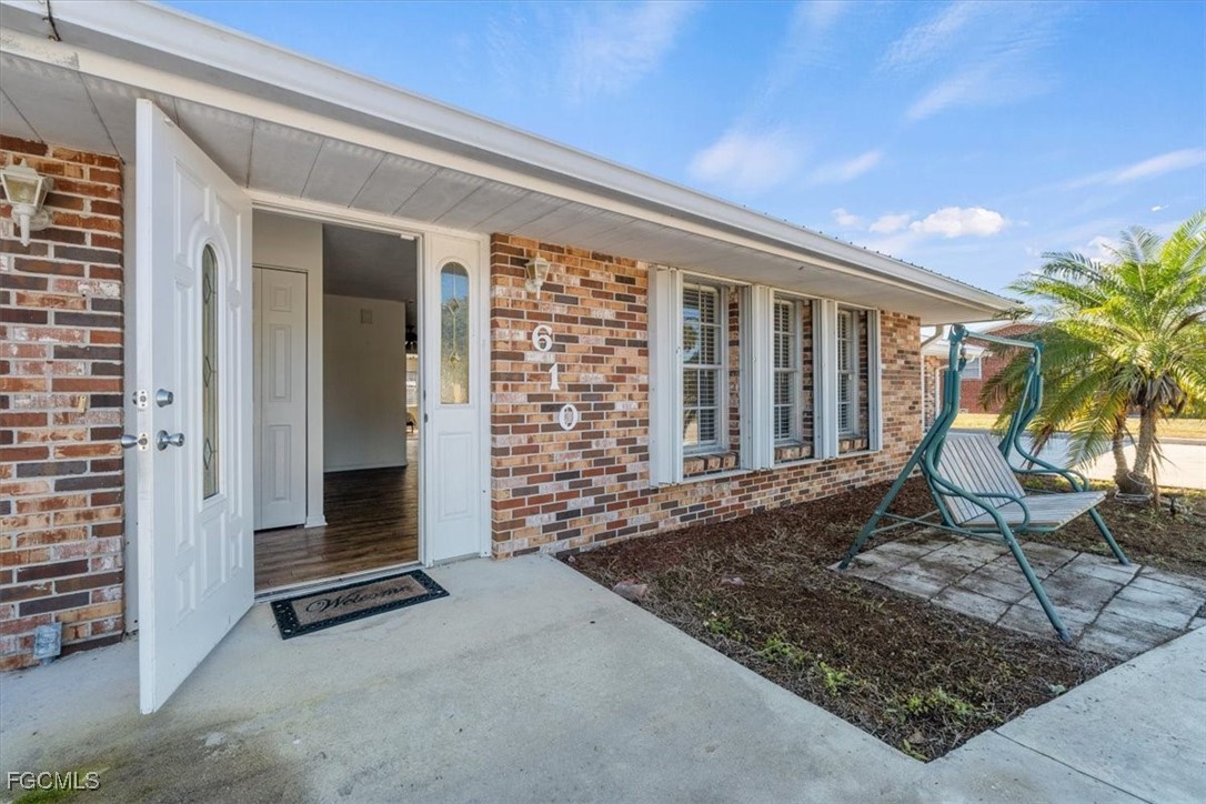 610 East Avenida Del Rio Clewiston, FL 33440 - Photo 5 of 49 a living room with fireplace furniture and a window