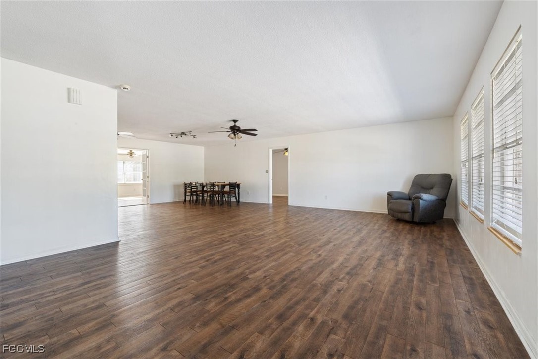 610 East Avenida Del Rio Clewiston, FL 33440 - Photo 9 of 49 a view of livingroom with furniture and wooden floor