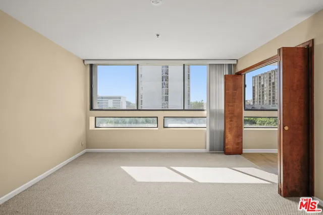 a kitchen with a sink stove and microwave