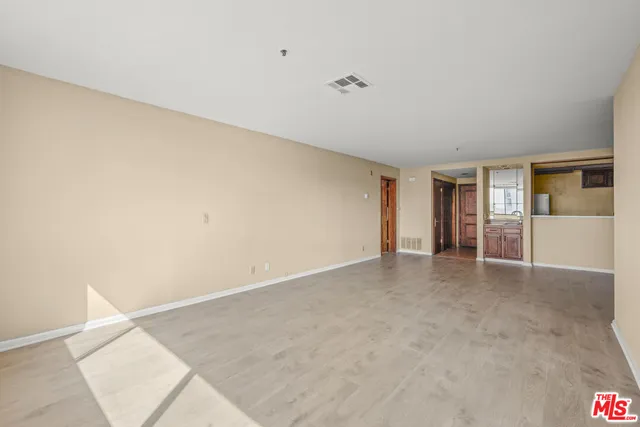 a view of hallway with natural light