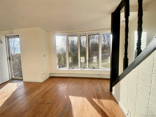 a kitchen with stainless steel appliances granite countertop a sink and a stove