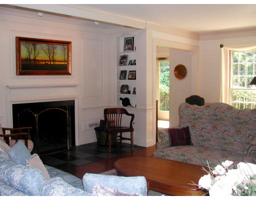 30 Lincoln Road Wellesley, MA 02481 - Photo 3 of 5 a living room with furniture and a fireplace