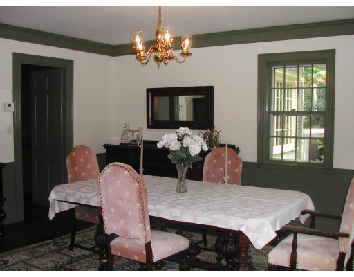 30 Lincoln Road Wellesley, MA 02481 - Photo 4 of 5 a view of a dining room with furniture and chandelier