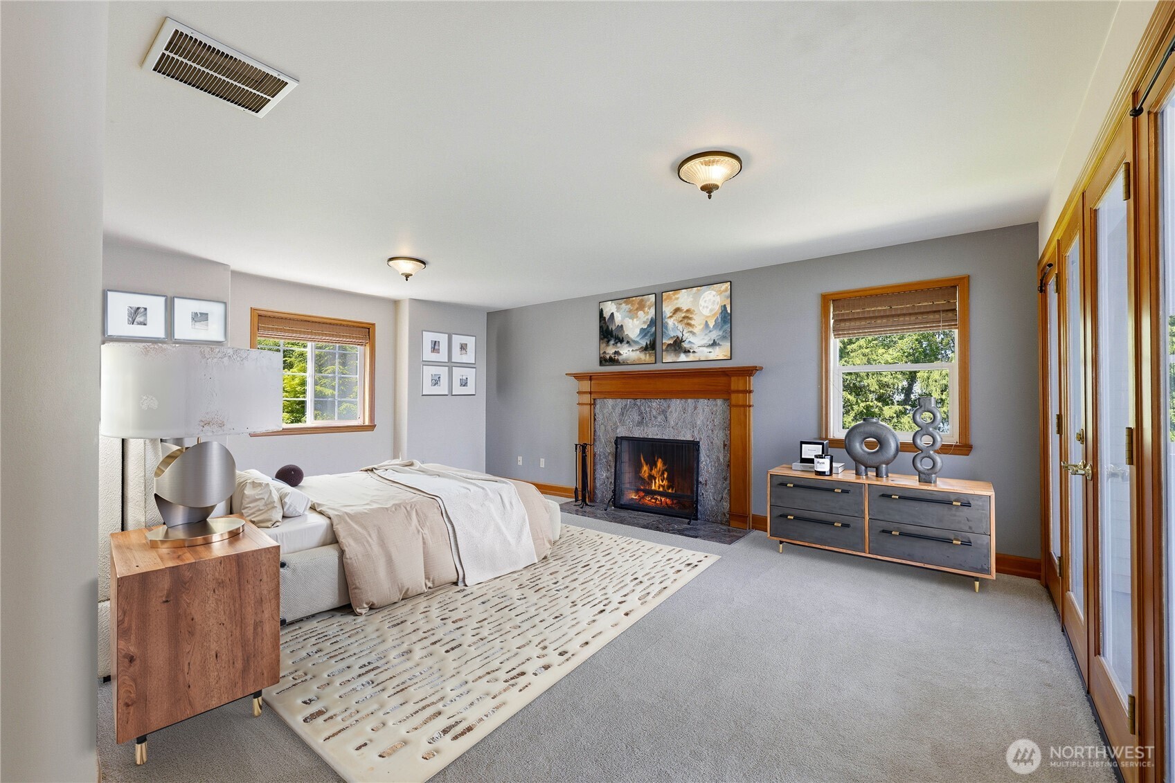 252 Jansen Road Nordland, WA 98358 - Photo 16 of 40 a bed room with a bed and a fireplace