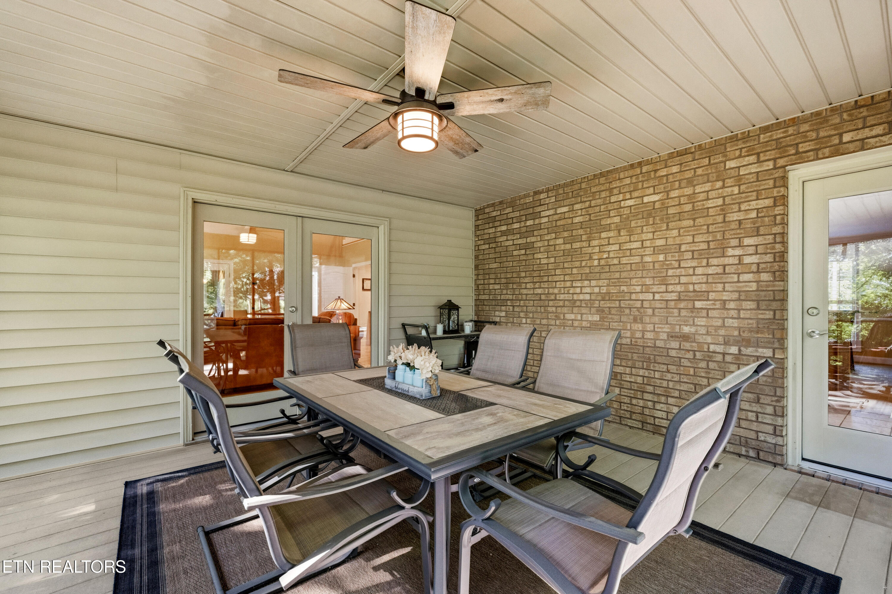 127 Ridgeland Lane Sharps Chapel, TN 37866 - Photo 23 of 52 Doors to living areas off porch