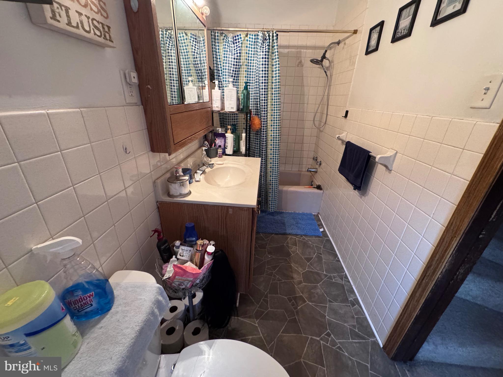 1128 North 6th Street Reading, PA 19601 - Photo 15 of 19 a bathroom with a sink toilet and shower