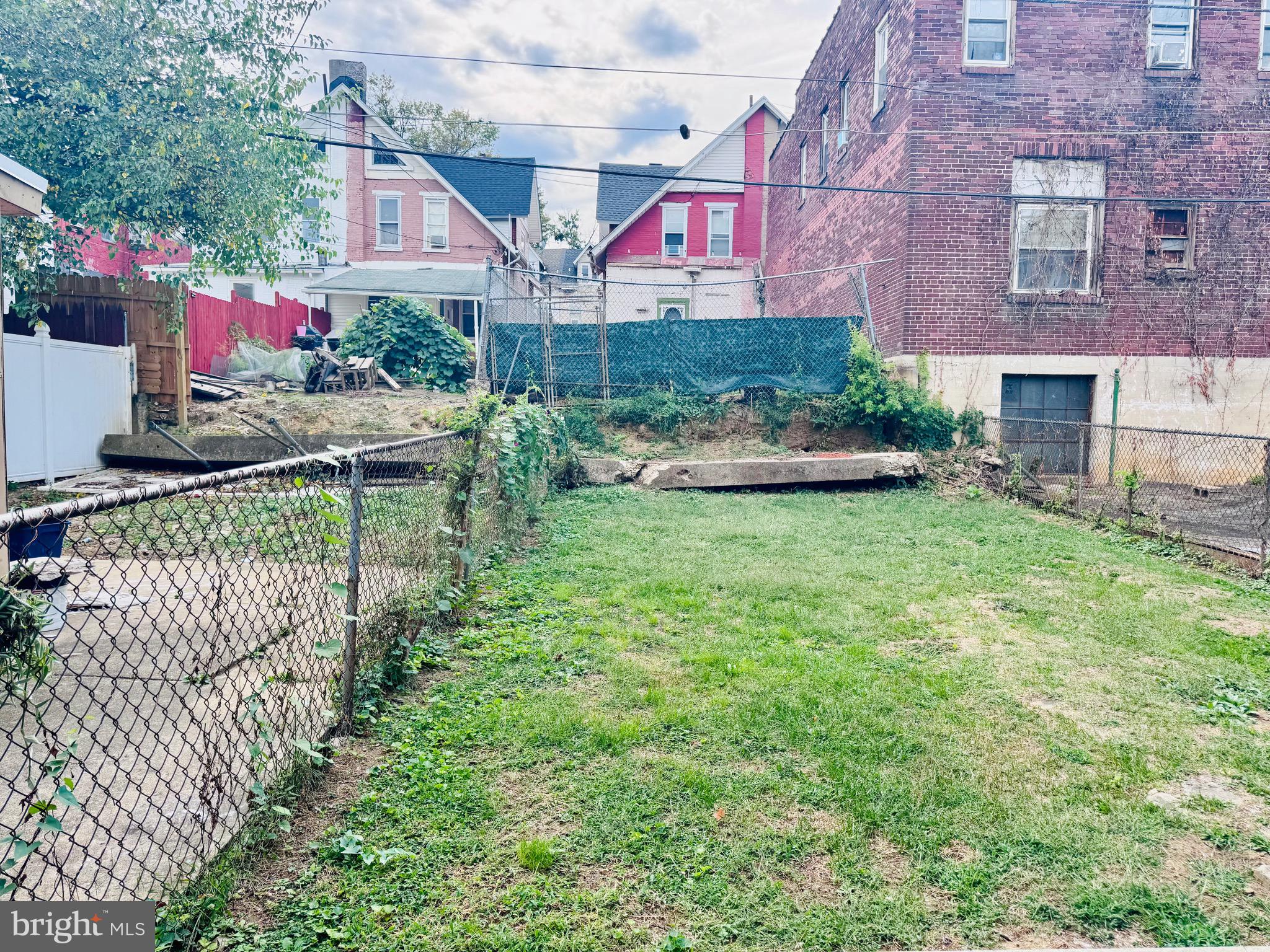 1128 North 6th Street Reading, PA 19601 - Photo 3 of 19 a front view of house with yard and seating area