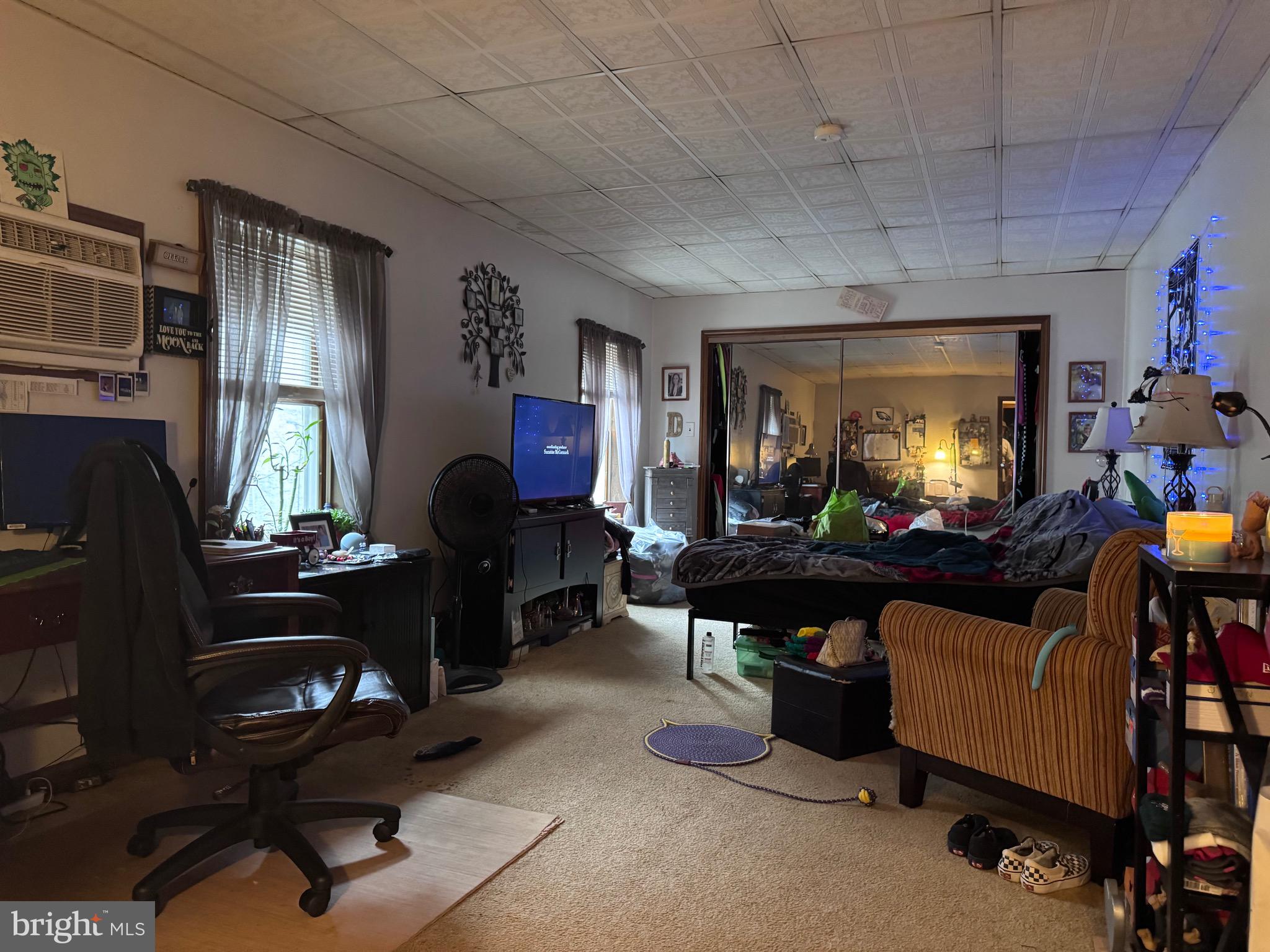 1128 North 6th Street Reading, PA 19601 - Photo 10 of 19 a living room with furniture and a window