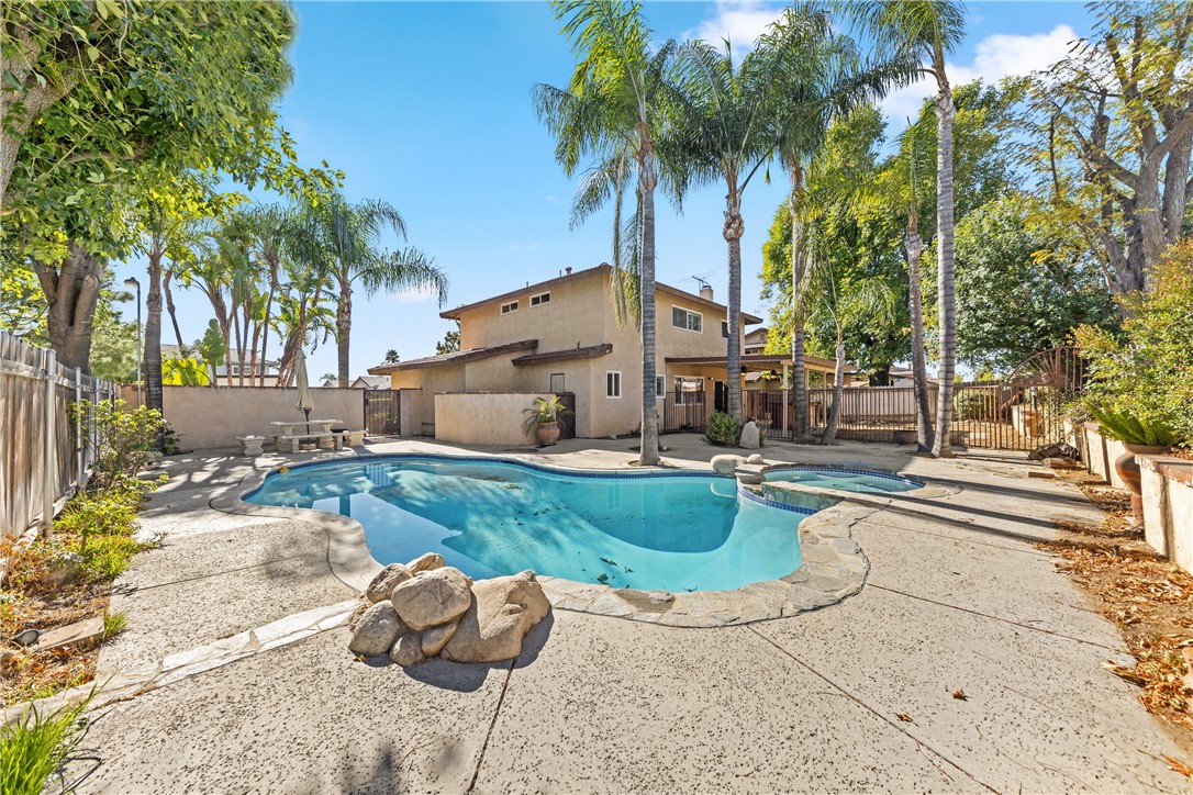 750 West Heather Street Rialto, CA 92376 - Photo 1 of 1 a house with palm tree in the background