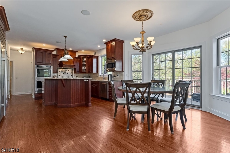 1 Brodziak Road Denville, NJ 07834 - Photo 9 of 42 a view of a dining room with furniture window and wooden floor