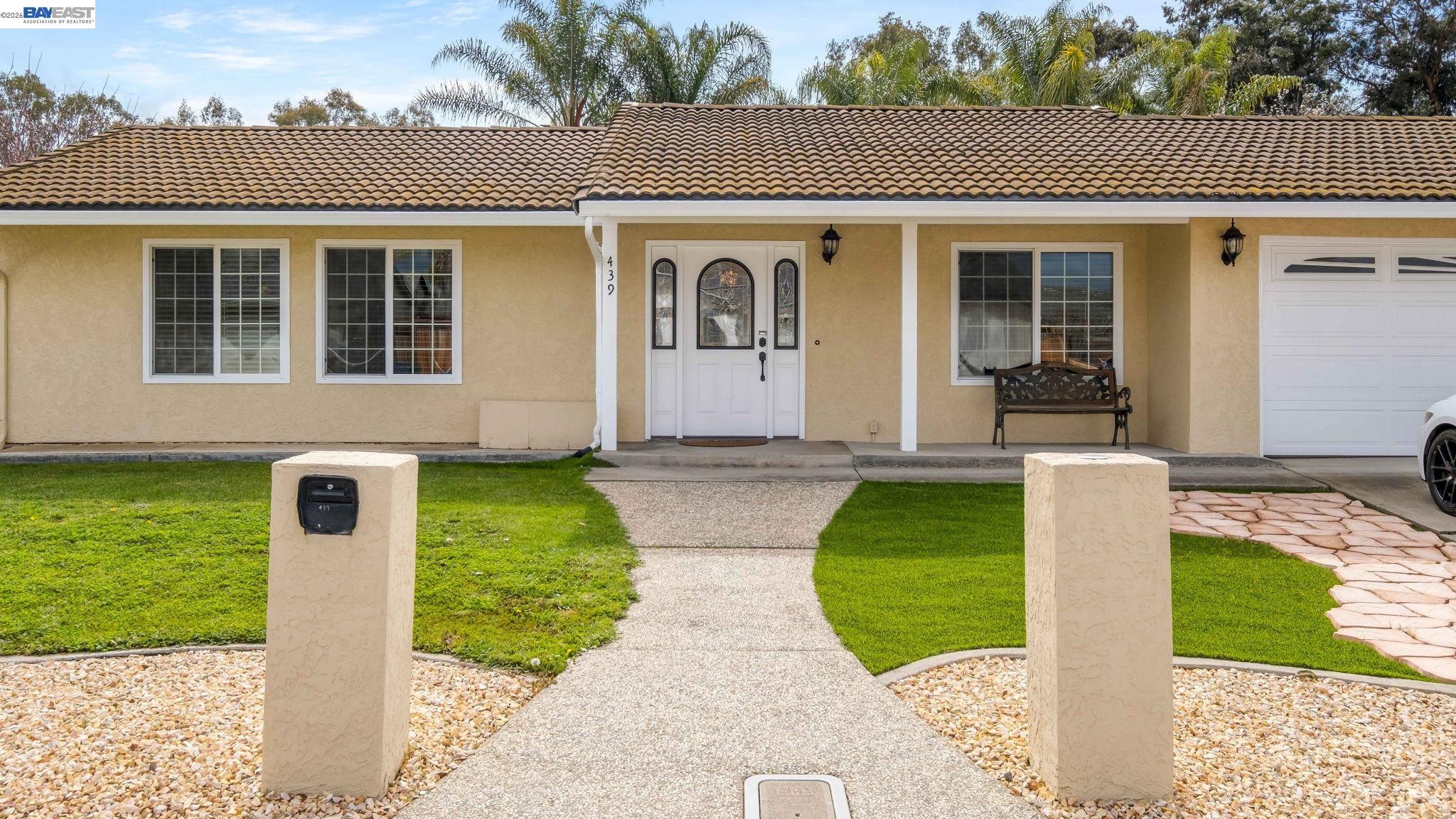 439 Hummingbird Lane Livermore, CA 94551 - Photo 1 of 1 a front view of a house with a yard