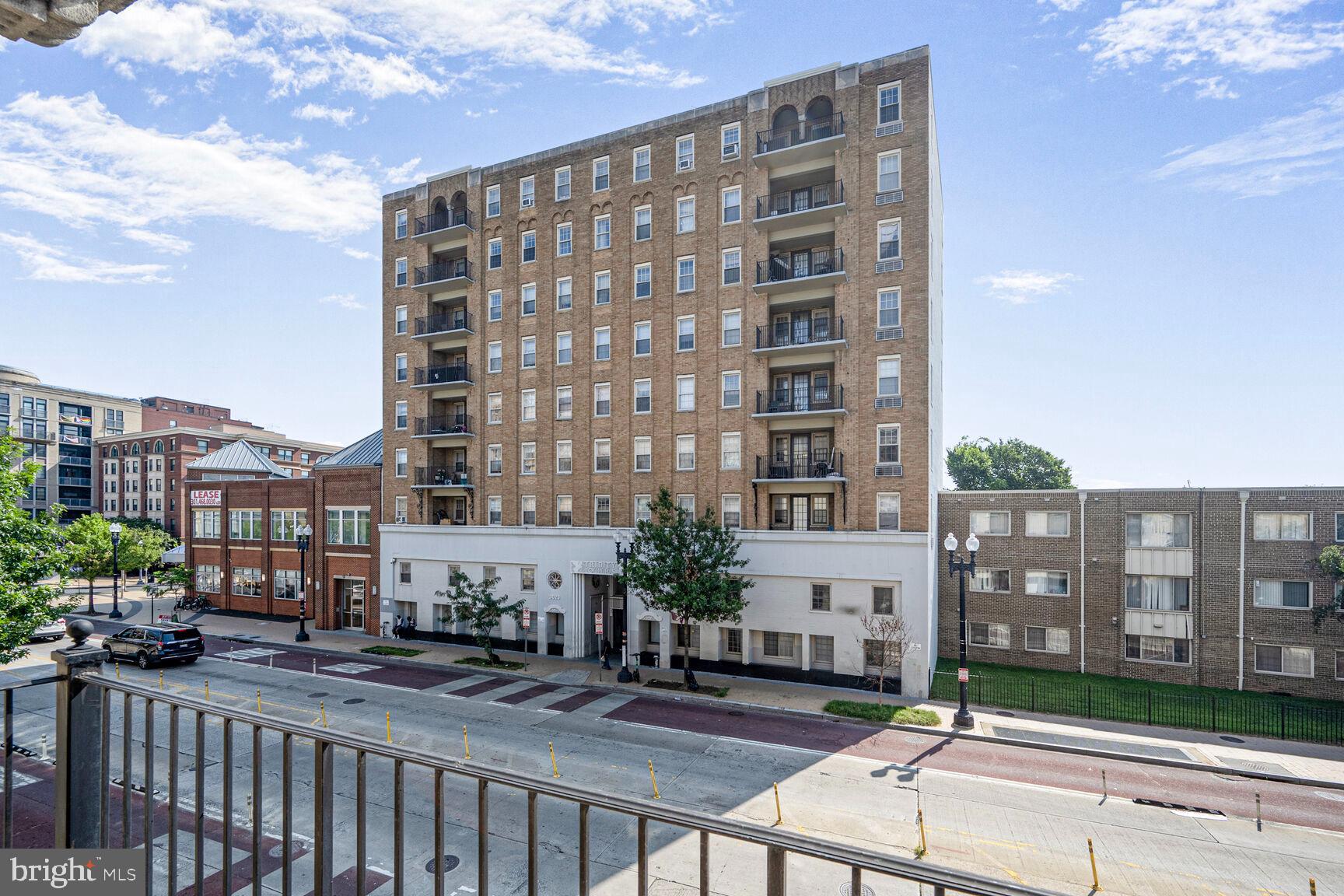1401 Columbia Road Northwest, Unit 213 Washington, DC 20009 - Photo 9 of 14 a view of a building with city street