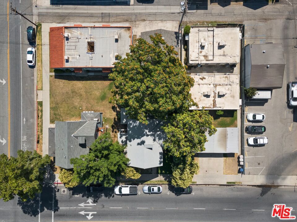 2020 F Street Bakersfield, CA 93301 - Photo 11 of 14 an aerial view of a house with a yard and a fountain