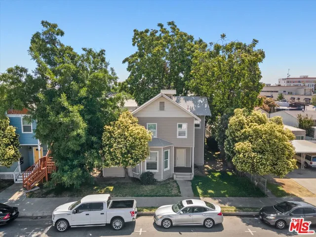 a car parked in front of a house