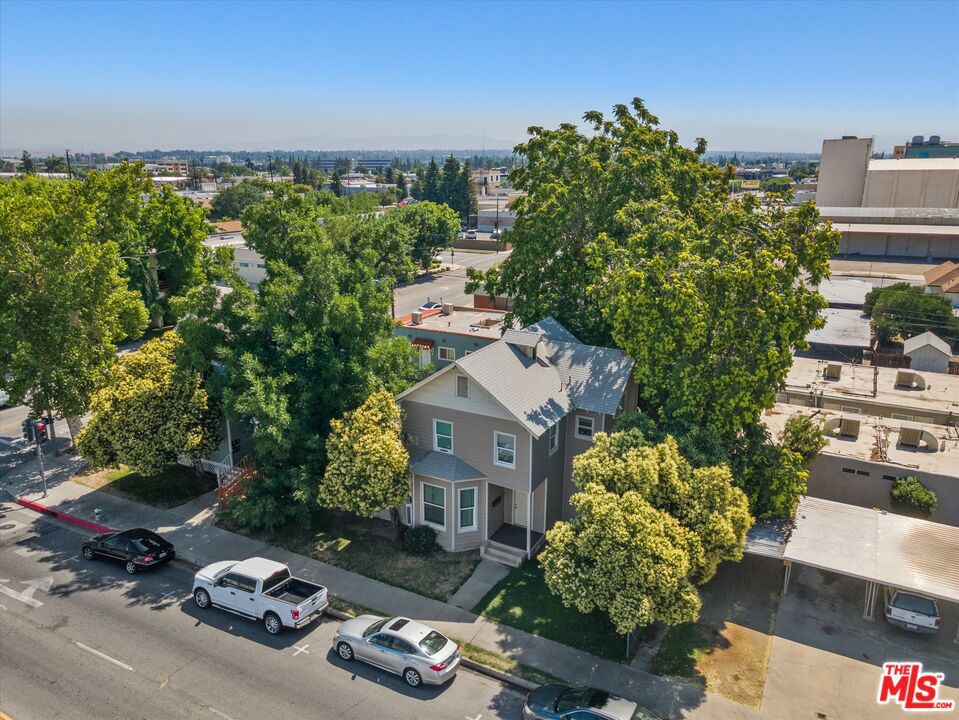 2020 F Street Bakersfield, CA 93301 - Photo 7 of 14 an aerial view of a house with a yard basket ball court and outdoor seating