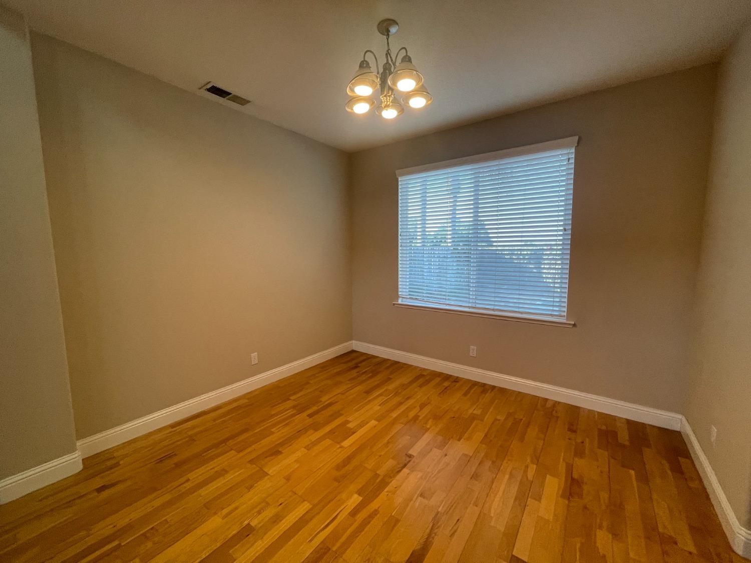2616 Goshen Avenue Clovis, CA 93611 - Photo 11 of 39 a view of an empty room and window