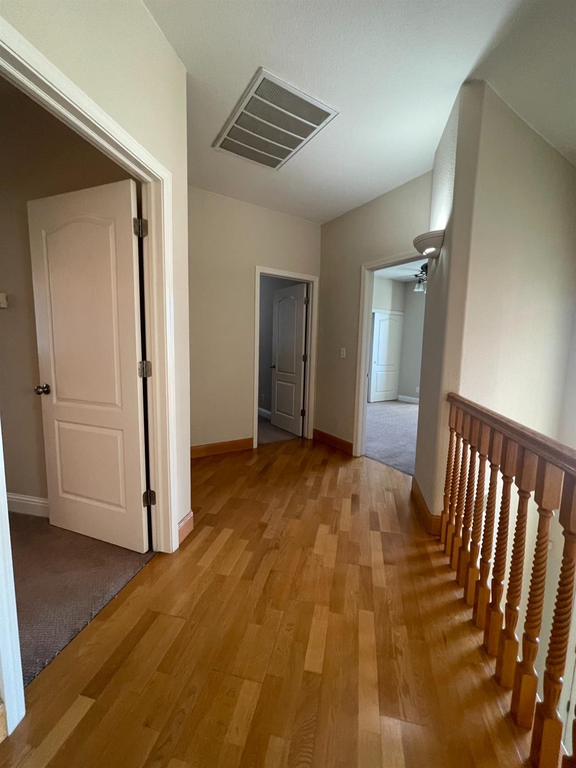 2616 Goshen Avenue Clovis, CA 93611 - Photo 24 of 39 a view of empty room with wooden floor