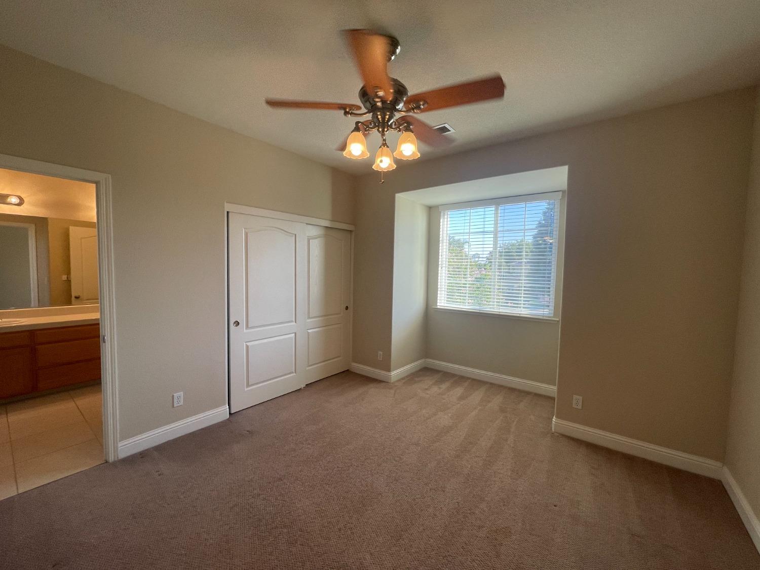 2616 Goshen Avenue Clovis, CA 93611 - Photo 25 of 39 a view of an empty room with a window