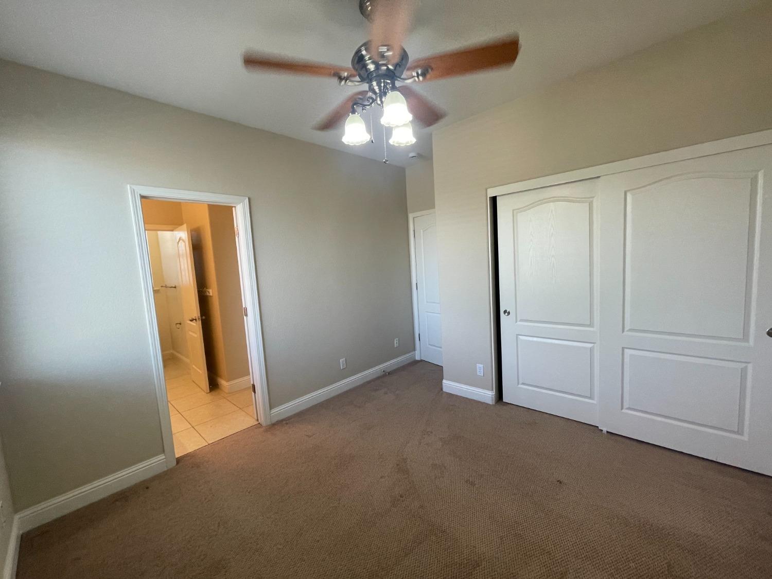 2616 Goshen Avenue Clovis, CA 93611 - Photo 31 of 39 a view of an empty room with a window