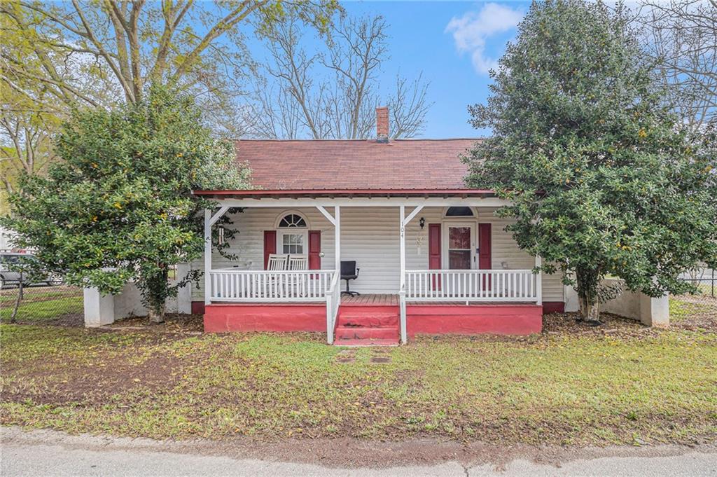 104 Williams Street Rutledge, GA 30663 - Photo 1 of 1 a front view of house with yard